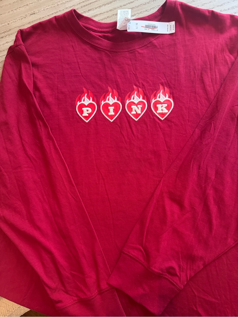 PINK Victoria's Secret Red Long-Sleeve Tee with Flaming Heart Graphics